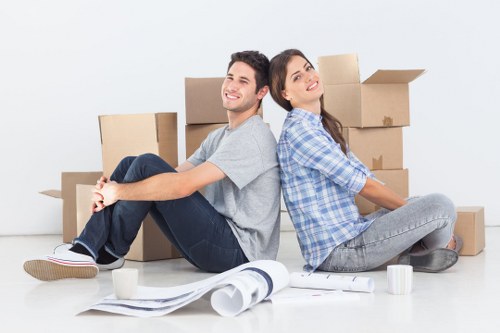 Local moving van transporting boxes and furniture in West Harrow