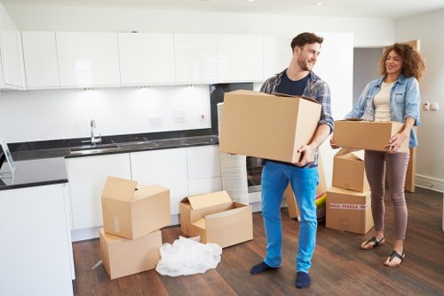 Staff discussing a safe moving plan for a property removal