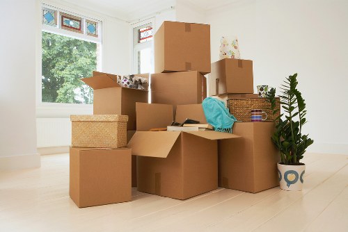 Packed household items prepared for removal truck hire in West Harrow