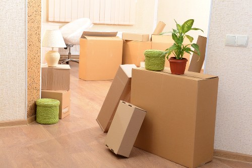Office furniture and boxes organised for a business relocation
