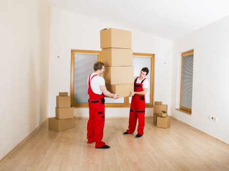 Removal team managing access and loading for an office move in West Harrow