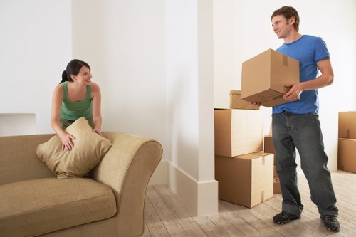 Professional movers planning access and loading for a house move in West Harrow