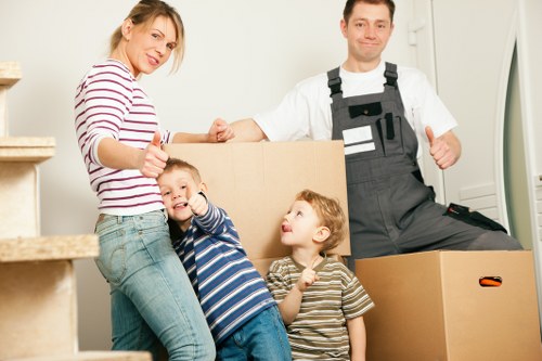 Van service handling household items in West Harrow streets